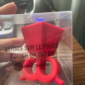 Nail polish finger holder